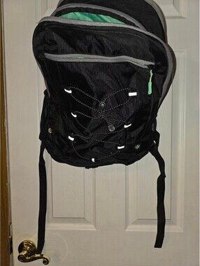 HP Black backpack with green lining